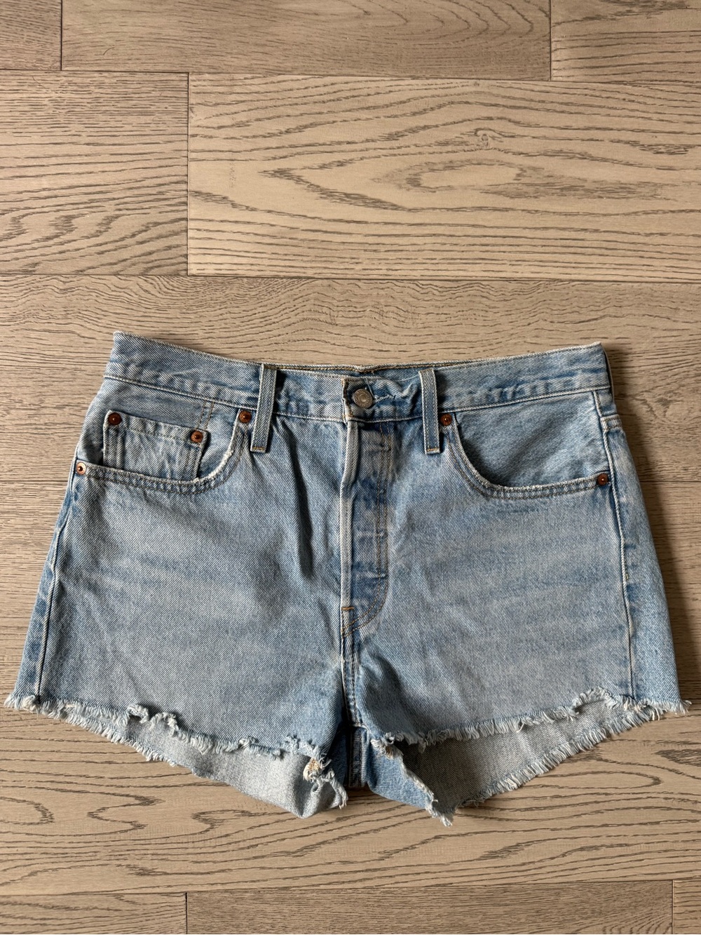 Levi's Light Blue Frayed Denim Cutoff Shorts